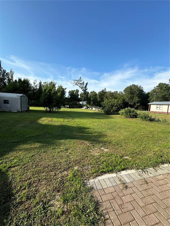 1326 Northeast Forrest Avenue Arcadia, FL 34266 - Photo 24 of 26 a view of a golf course with a lake
