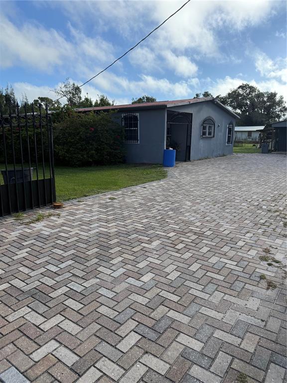 1326 Northeast Forrest Avenue Arcadia, FL 34266 - Photo 26 of 26 a view of a house with a yard