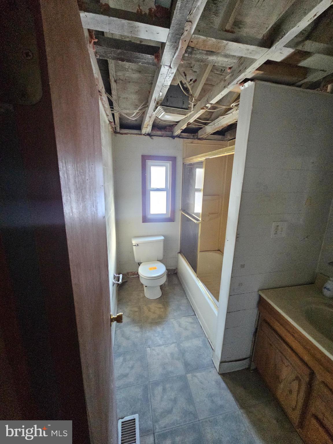 1915 Arundel Road Pasadena, MD 21122 - Photo 12 of 16 a bathroom with a sink and toilet