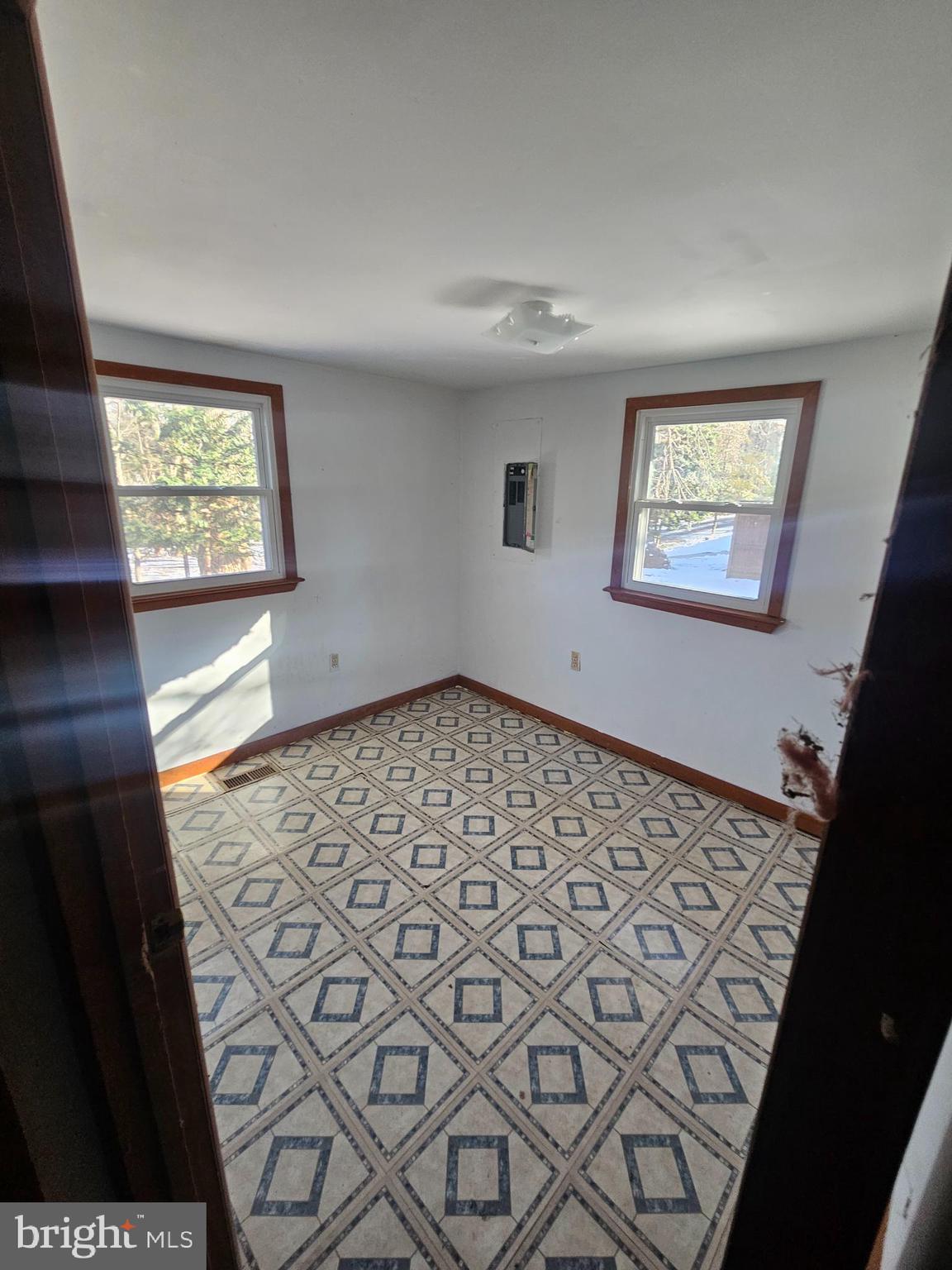 1915 Arundel Road Pasadena, MD 21122 - Photo 15 of 16 a view of an empty room and window