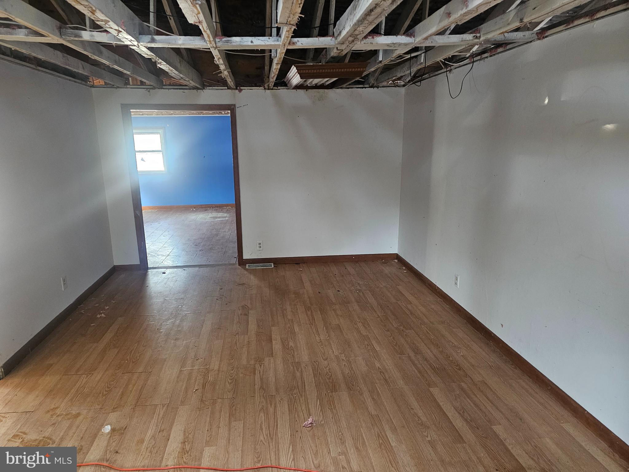 1915 Arundel Road Pasadena, MD 21122 - Photo 7 of 16 a view of an empty room with wooden floor