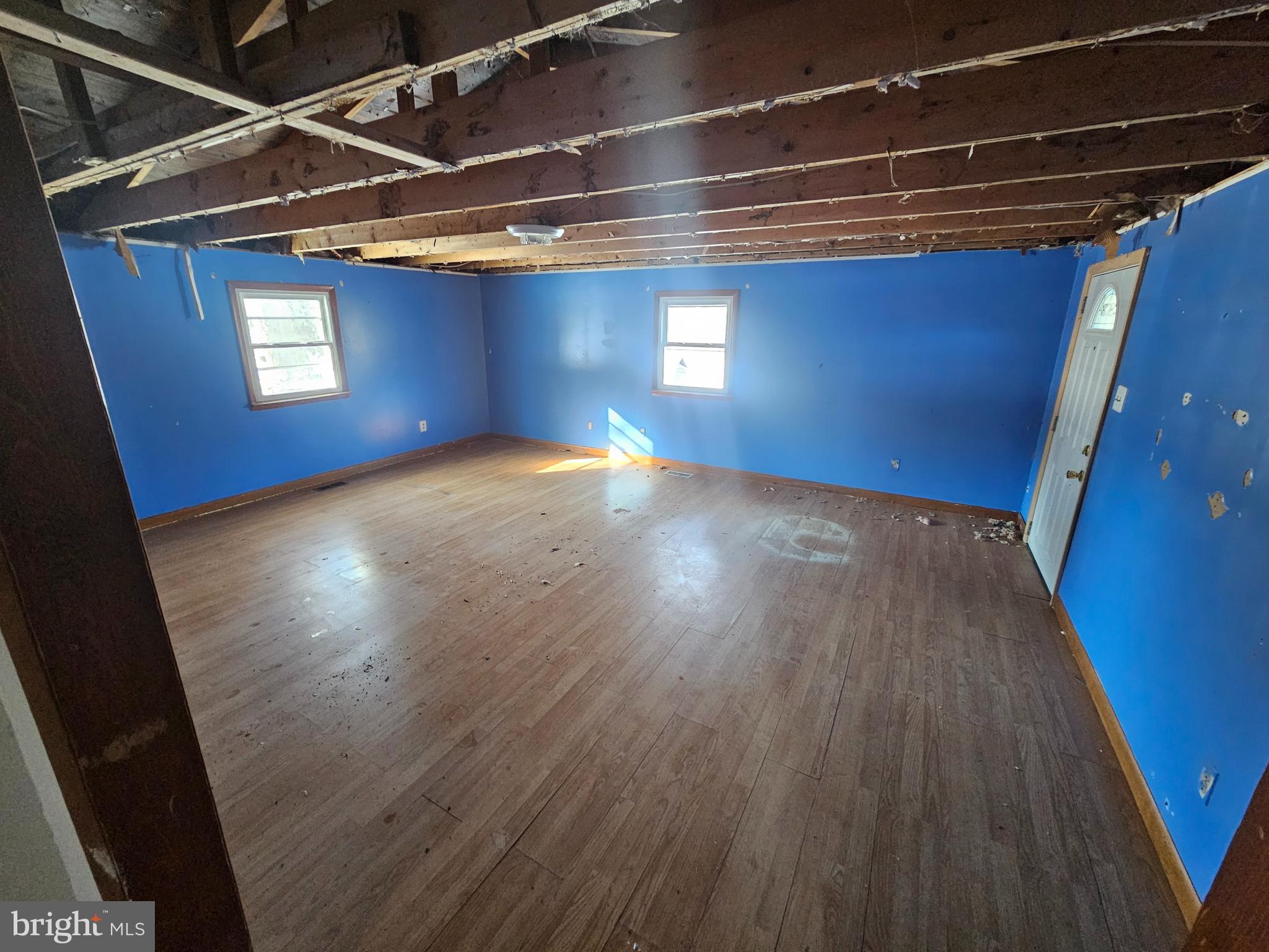 1915 Arundel Road Pasadena, MD 21122 - Photo 8 of 16 a view of empty room with wooden floor