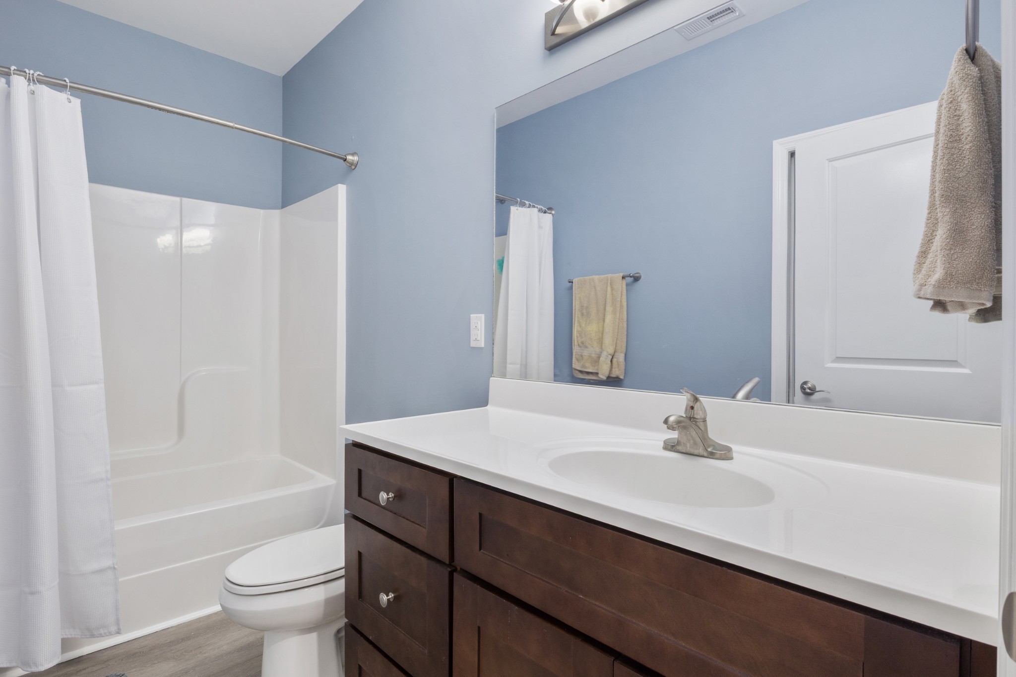 791 French River Road Nolensville, TN 37135 - Photo 31 of 48 a bathroom with a sink a toilet and a large mirror