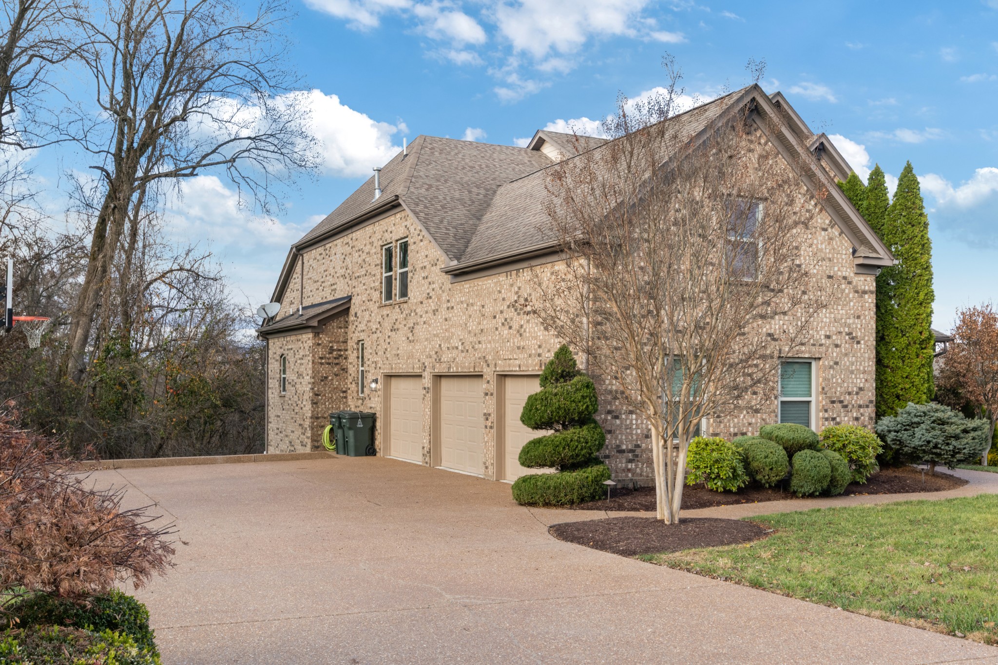 791 French River Road Nolensville, TN 37135 - Photo 4 of 48 a front view of a house with a yard and potted plants