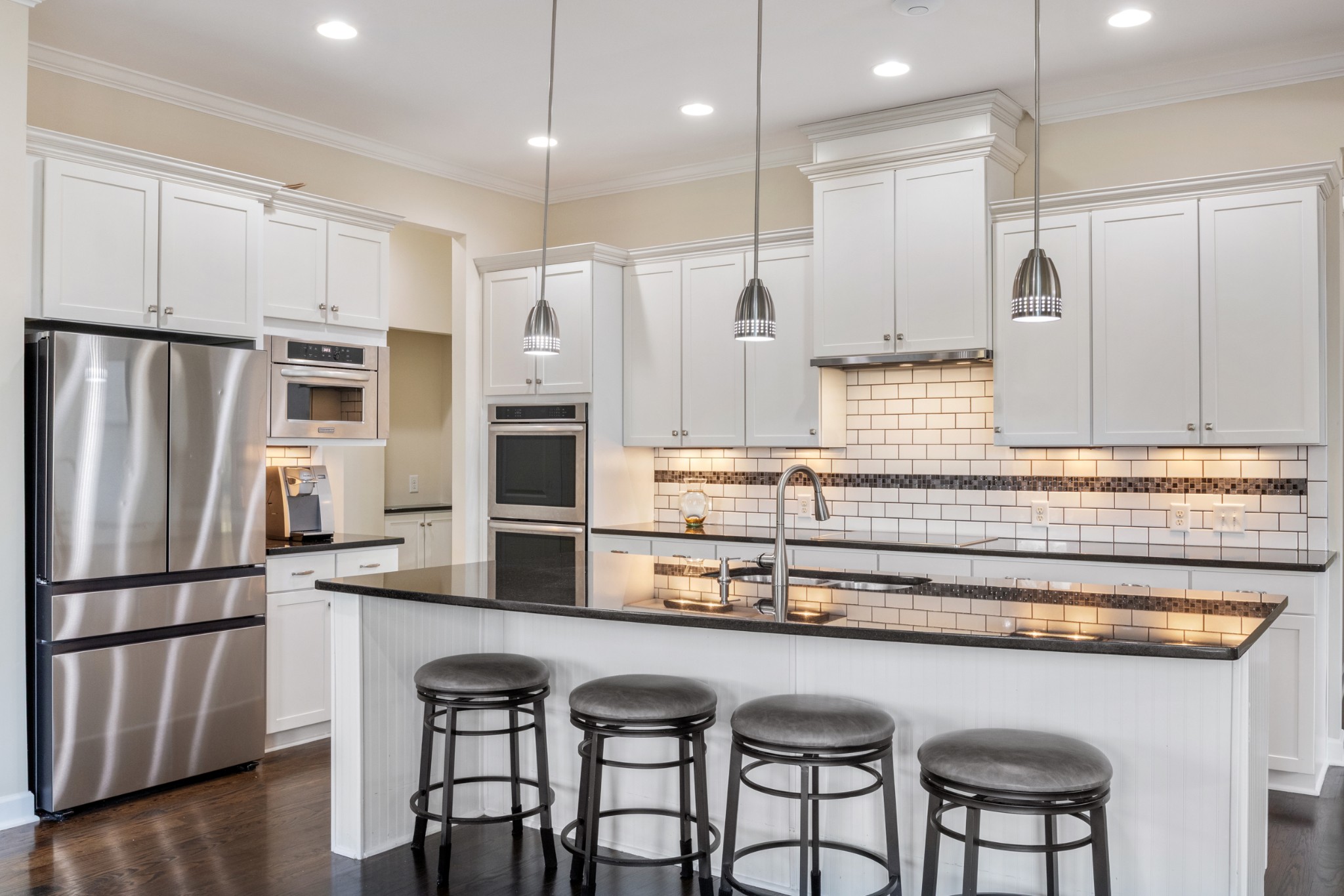 791 French River Road Nolensville, TN 37135 - Photo 10 of 48 a kitchen with stainless steel appliances granite countertop a refrigerator a sink and white cabinets