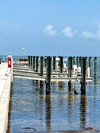a view of swimming pool with seating space