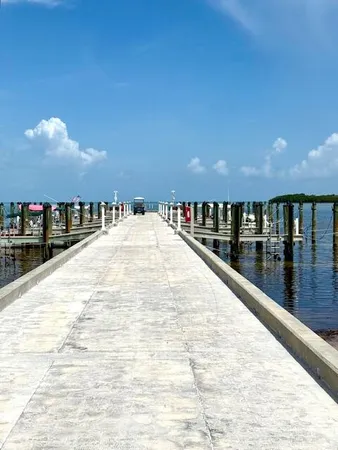 a view of swimming pool with outdoor seating
