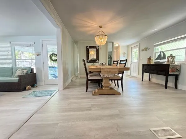 a view of a dining room with furniture