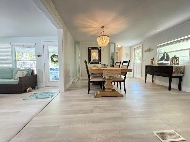 a view of a dining room with furniture