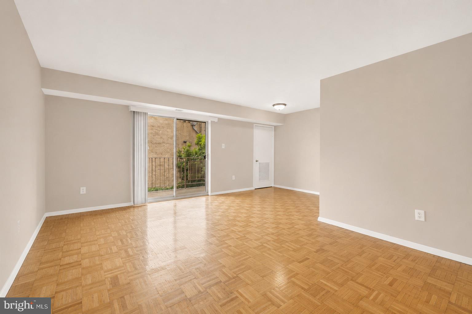 7056 Eastern Avenue Northwest, Unit 107 Washington, DC 20012 - Photo 8 of 36 Large living room area!