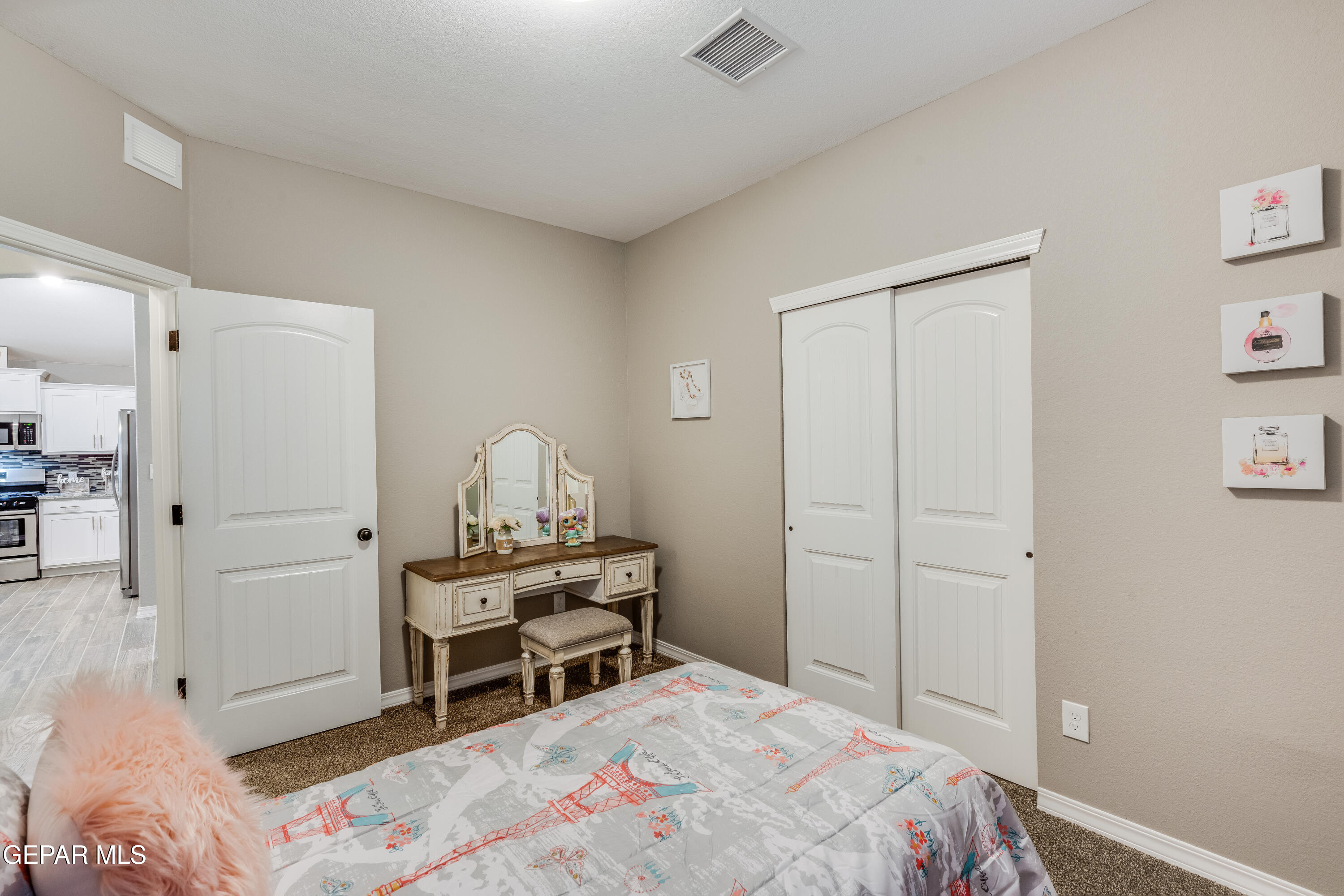 512 Caddo Lane Clint, TX 79836 - Photo 2 of 38 a bedroom with a bed and a chair in it