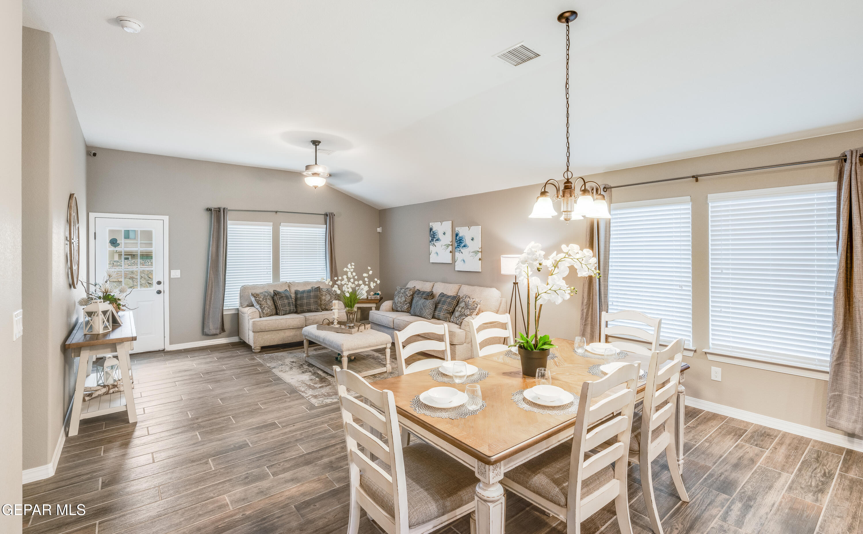 512 Caddo Lane Clint, TX 79836 - Photo 22 of 38 a view of a dining room with furniture window and wooden floor