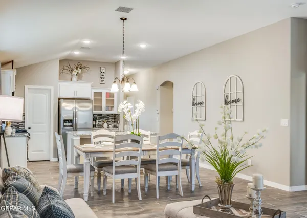 a view of a dining room with furniture