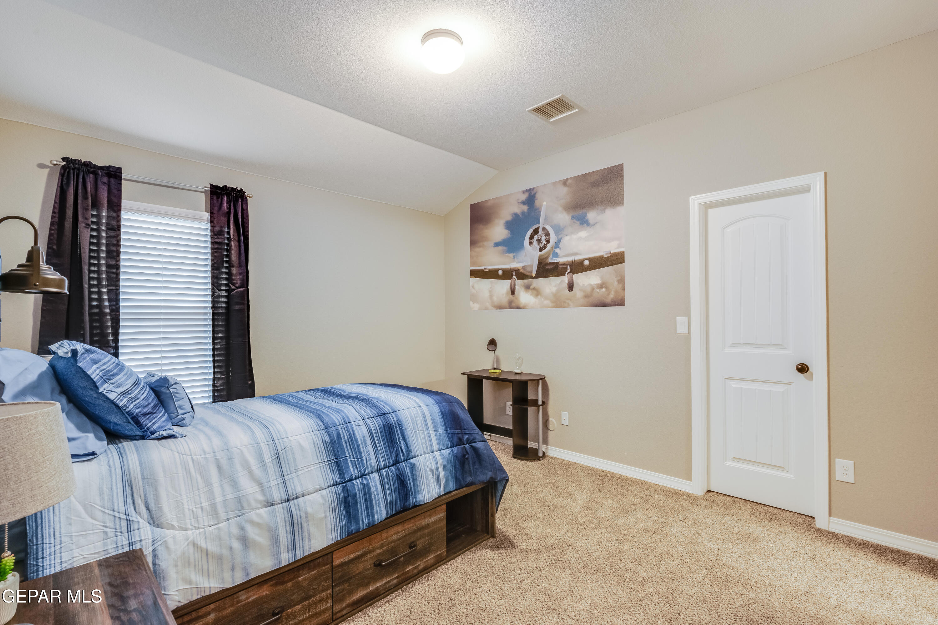 512 Caddo Lane Clint, TX 79836 - Photo 33 of 38 a bedroom with a bed and window
