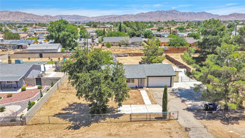 15471 Washoan Road Apple Valley, CA 92307 - Photo 34 of 38 a view of a city with a mountain