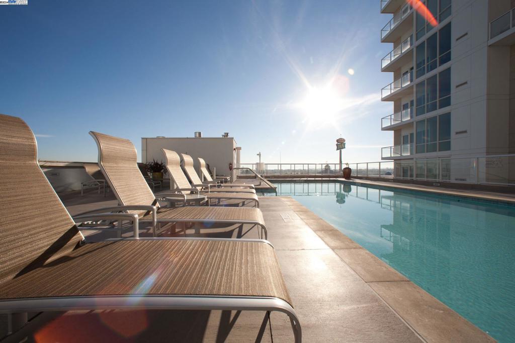 a view of a balcony with chairs