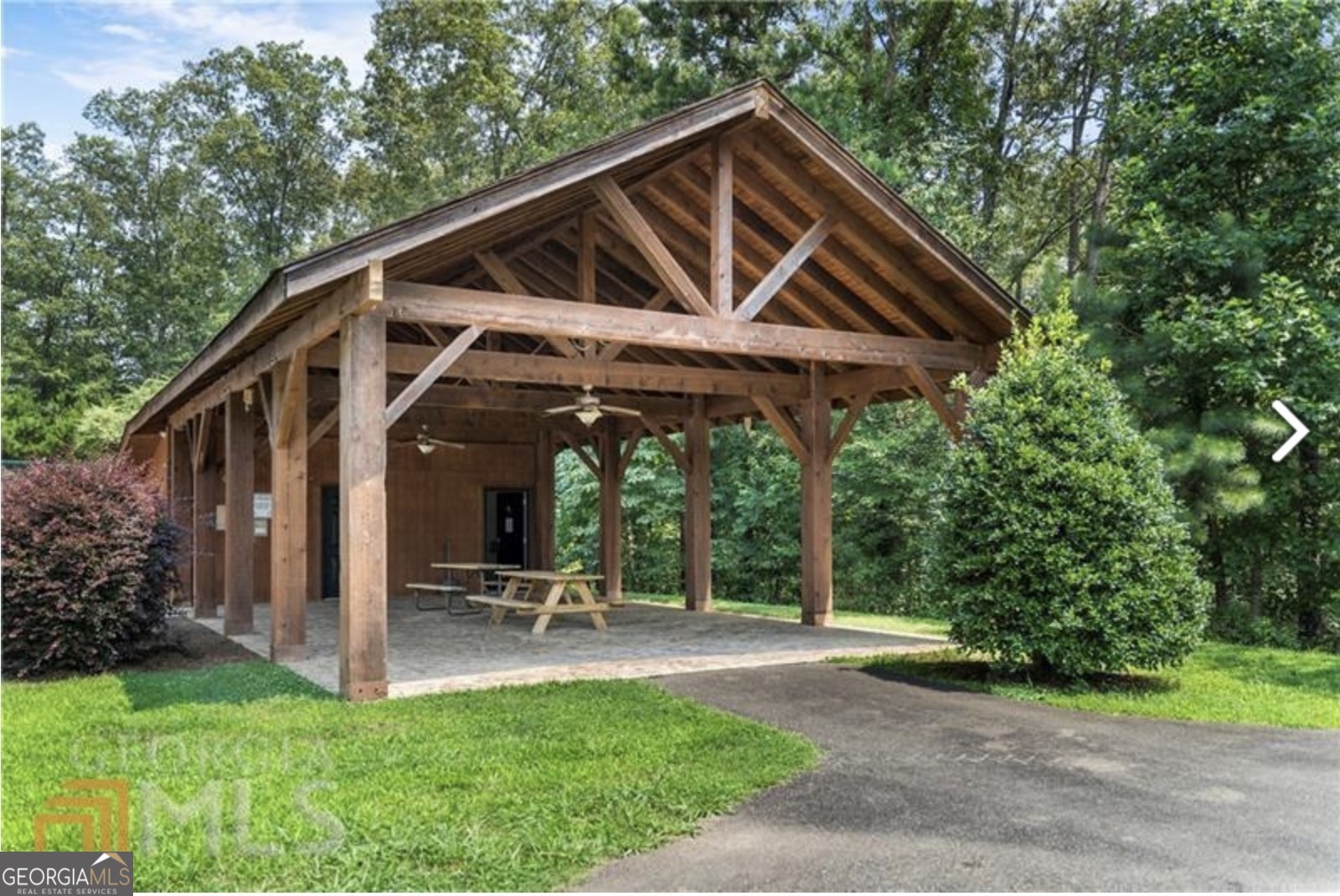945 Longbranch Drive Ranger, GA 30734 - Photo 3 of 11 a view of a chair and table in backyard of the house