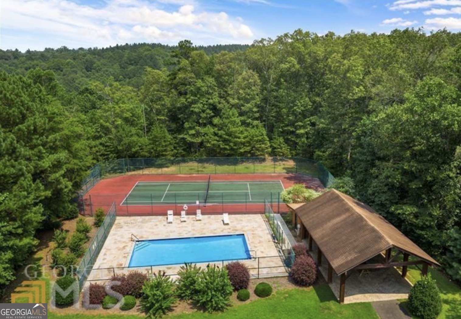 945 Longbranch Drive Ranger, GA 30734 - Photo 6 of 11 a view of a yard with an outdoor seating