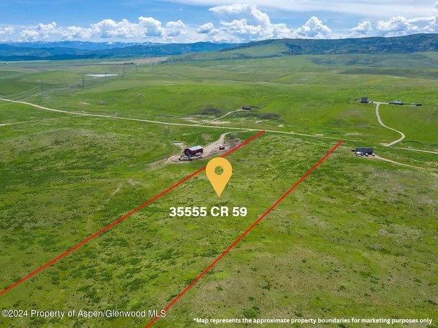 a view of a golf course with a garden