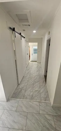 a view of an empty walk in closet