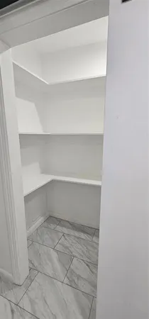 a view of a room with an empty space