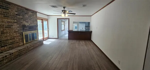 a view of livingroom with kitchen