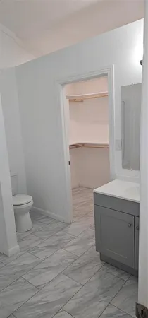 a room with a toilet and a sink