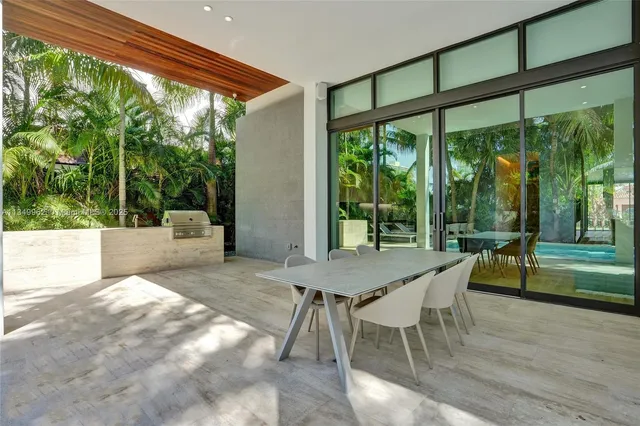a bathroom with a shower toilet and sink
