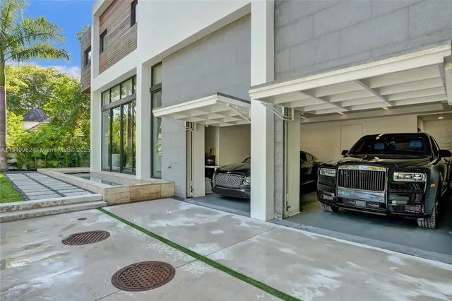 a view of a pathway both side of the house