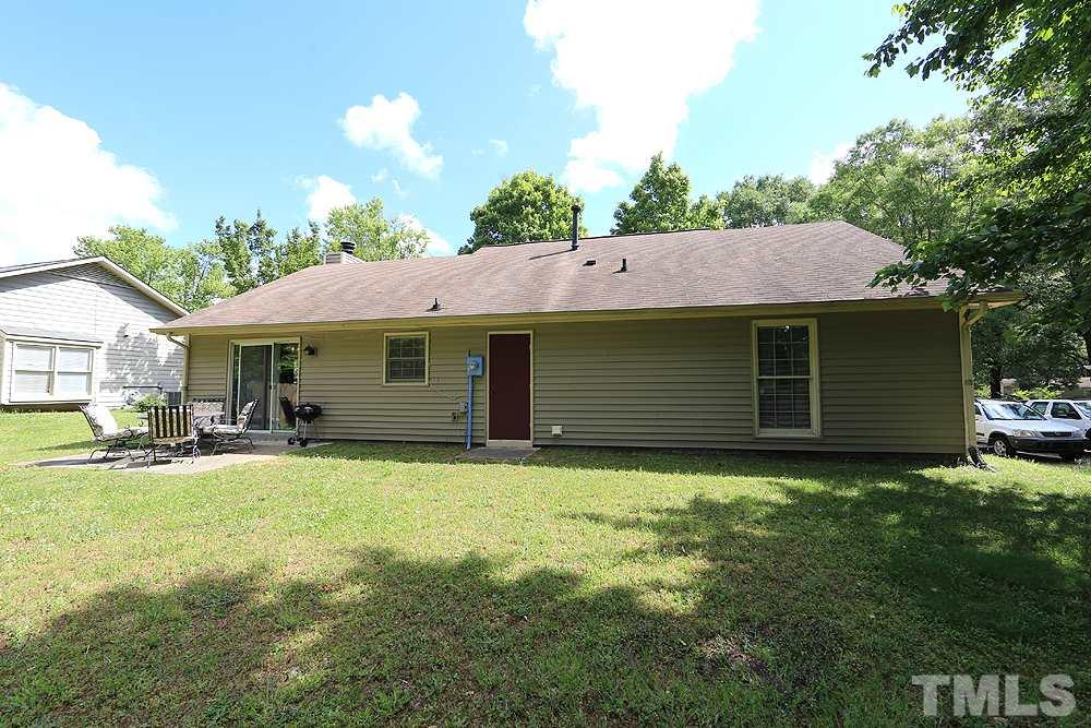 4509 Fox Road Raleigh, NC 27616 - Photo 13 of 13 a view of a house with a yard and sitting area