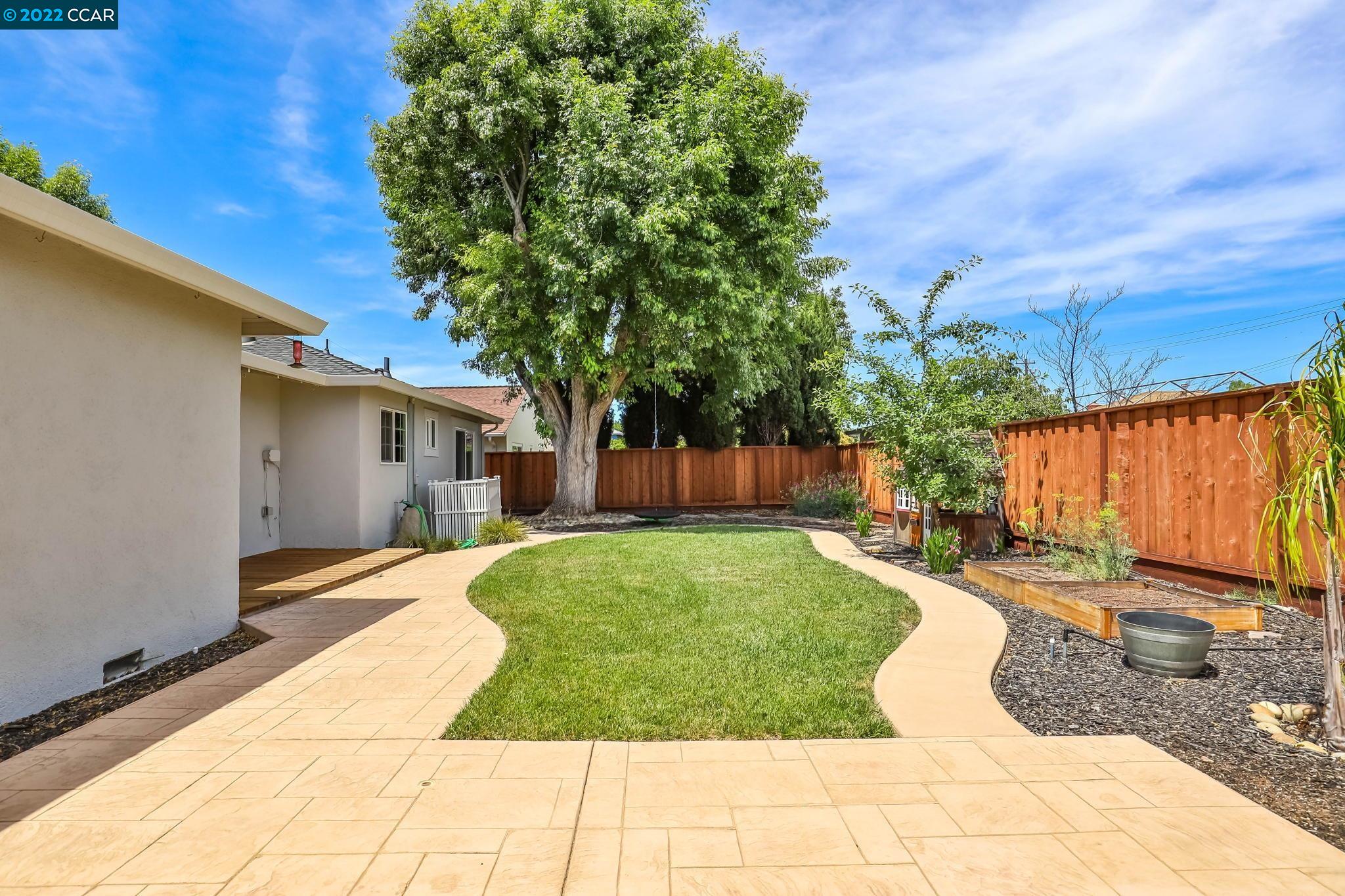 2144 Dena Drive Concord, CA 94519 - Photo 18 of 27 a view of a backyard with sitting area