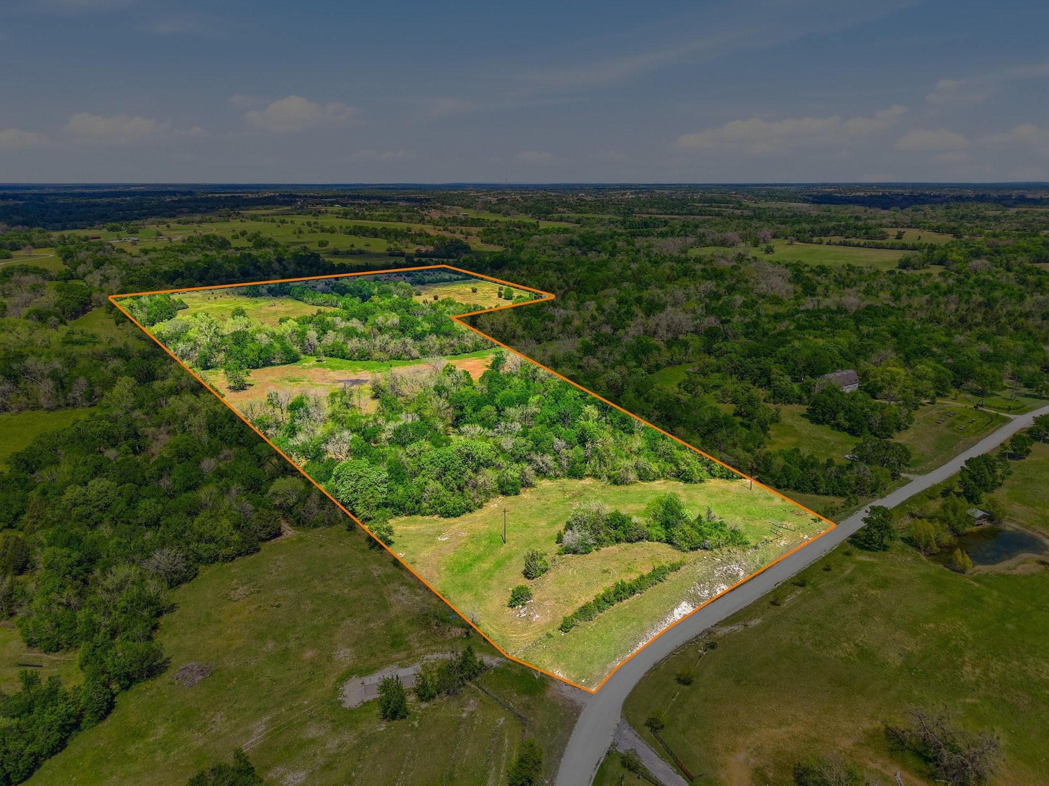 405 County Road 405 Anderson, TX 77830 - Photo 5 of 7 a view of a back yard from a balcony