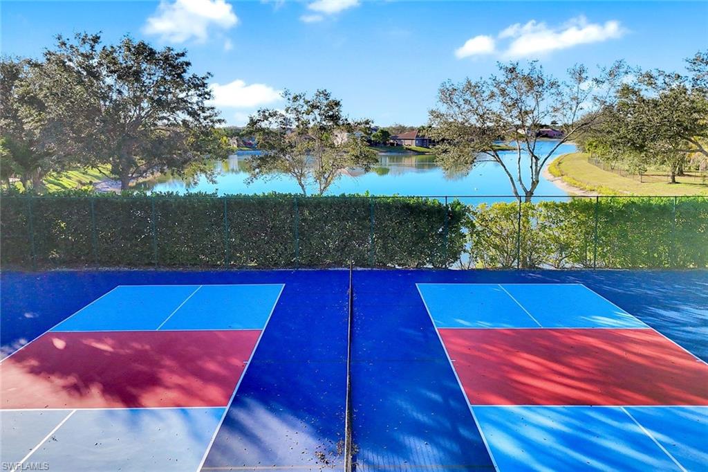 2143 Grove Drive Naples, FL 34120 - Photo 35 of 37 View of basketball court with a water view