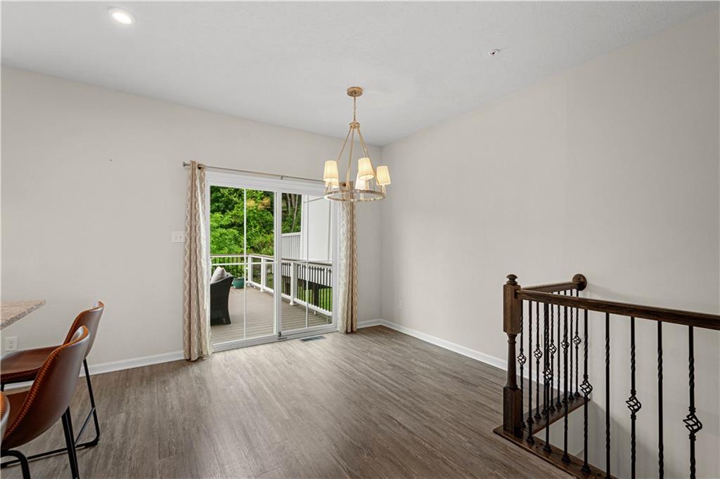 152-160 Cole Drive McKees Rocks, PA 15136 - Photo 14 of 39 a view of a dining room with furniture window and wooden floor