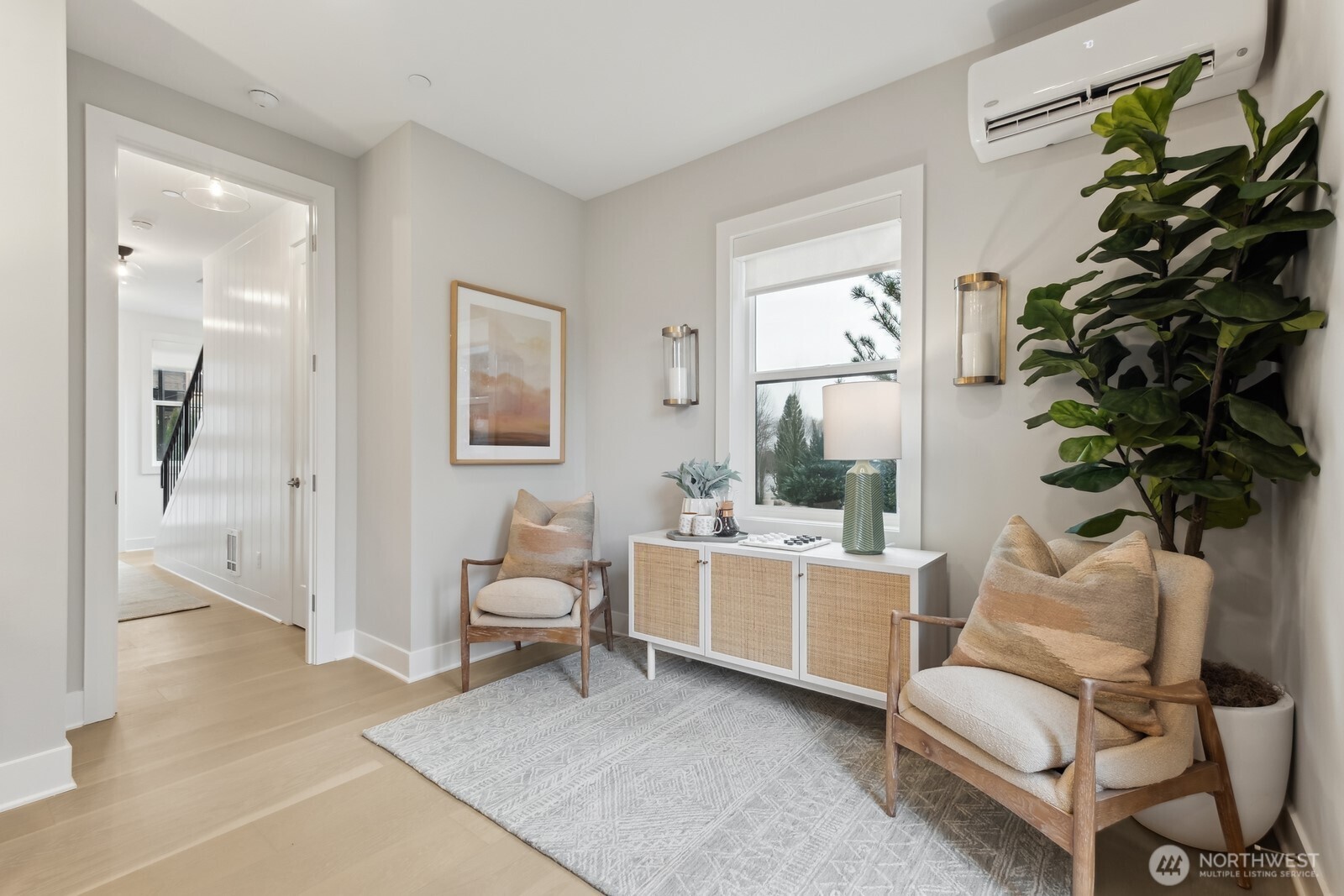 18923 99th Place Northeast, Unit A Bothell, WA 98011 - Photo 4 of 27 a living room with furniture and a potted plant