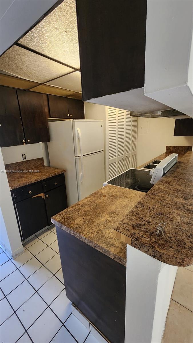 4425 Treehouse Lane, Unit B Tamarac, FL 33319 - Photo 11 of 19 a close view of washer and dryer