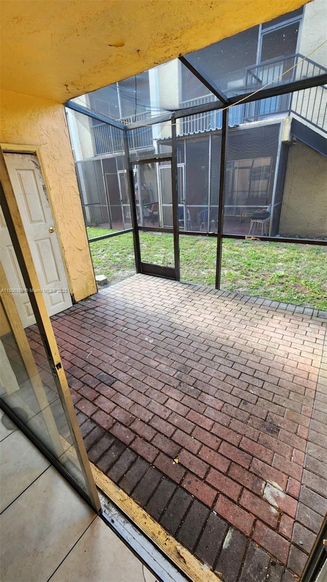 4425 Treehouse Lane, Unit B Tamarac, FL 33319 - Photo 15 of 19 a view of a backyard