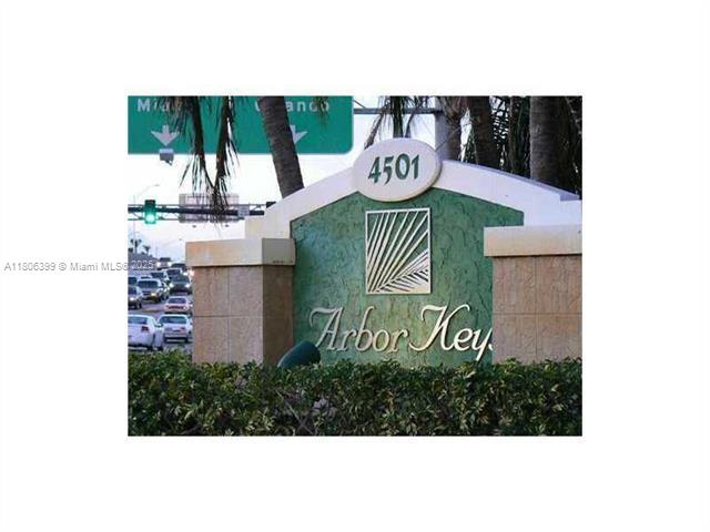 4425 Treehouse Lane, Unit B Tamarac, FL 33319 - Photo 2 of 19 a view of a table and chairs in a patio