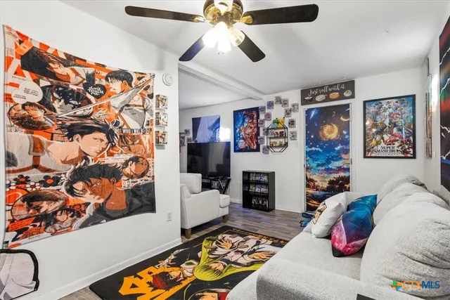 a bedroom with a bed and a couch