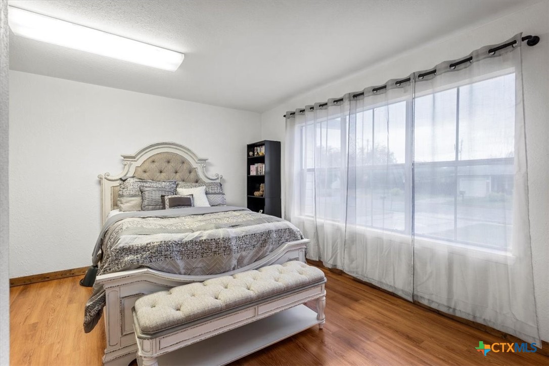 1102 South 5th Street Copperas Cove, TX 76522 - Photo 25 of 40 a bedroom with a bed and a window