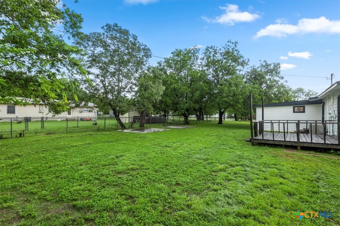 1102 South 5th Street Copperas Cove, TX 76522 - Photo 35 of 40 a view of yard with green space and trees