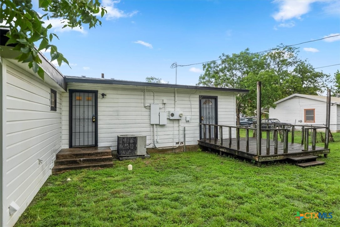 1102 South 5th Street Copperas Cove, TX 76522 - Photo 40 of 40 a view of a house with a yard and deck