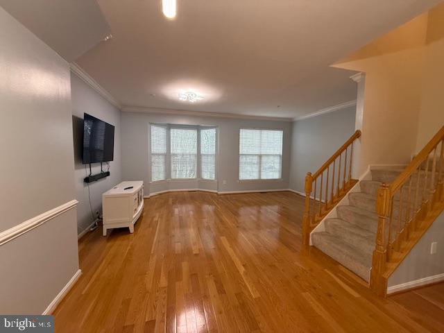 11777 Skylark Road Clarksburg, MD 20871 - Photo 16 of 75 a living room with a flat screen tv and a couch