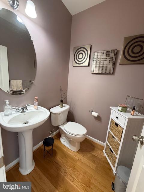 11777 Skylark Road Clarksburg, MD 20871 - Photo 26 of 75 a bathroom with a sink toilet and a mirror