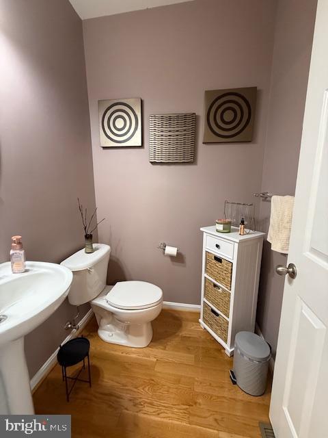11777 Skylark Road Clarksburg, MD 20871 - Photo 27 of 75 a view of a bathroom with a sink and a toilet