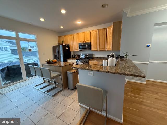 11777 Skylark Road Clarksburg, MD 20871 - Photo 4 of 75 a kitchen with a sink dining table and chairs