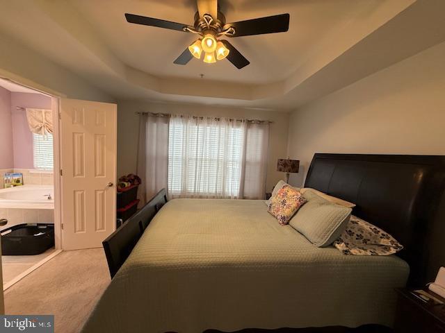 11777 Skylark Road Clarksburg, MD 20871 - Photo 41 of 75 a bedroom with a bed and a chandelier