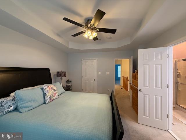 11777 Skylark Road Clarksburg, MD 20871 - Photo 43 of 75 a bedroom with a bed and a chandelier