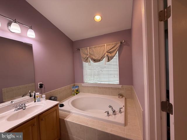 11777 Skylark Road Clarksburg, MD 20871 - Photo 45 of 75 a bathroom with a tub sink and mirror