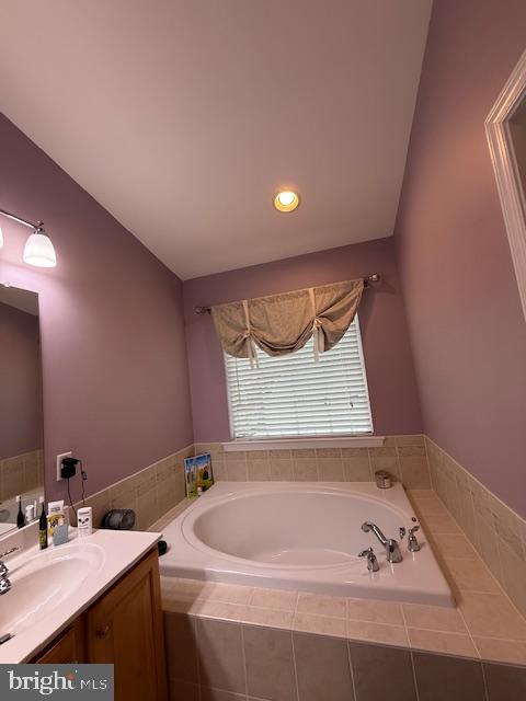 11777 Skylark Road Clarksburg, MD 20871 - Photo 47 of 75 a bathroom with a bathtub and a sink
